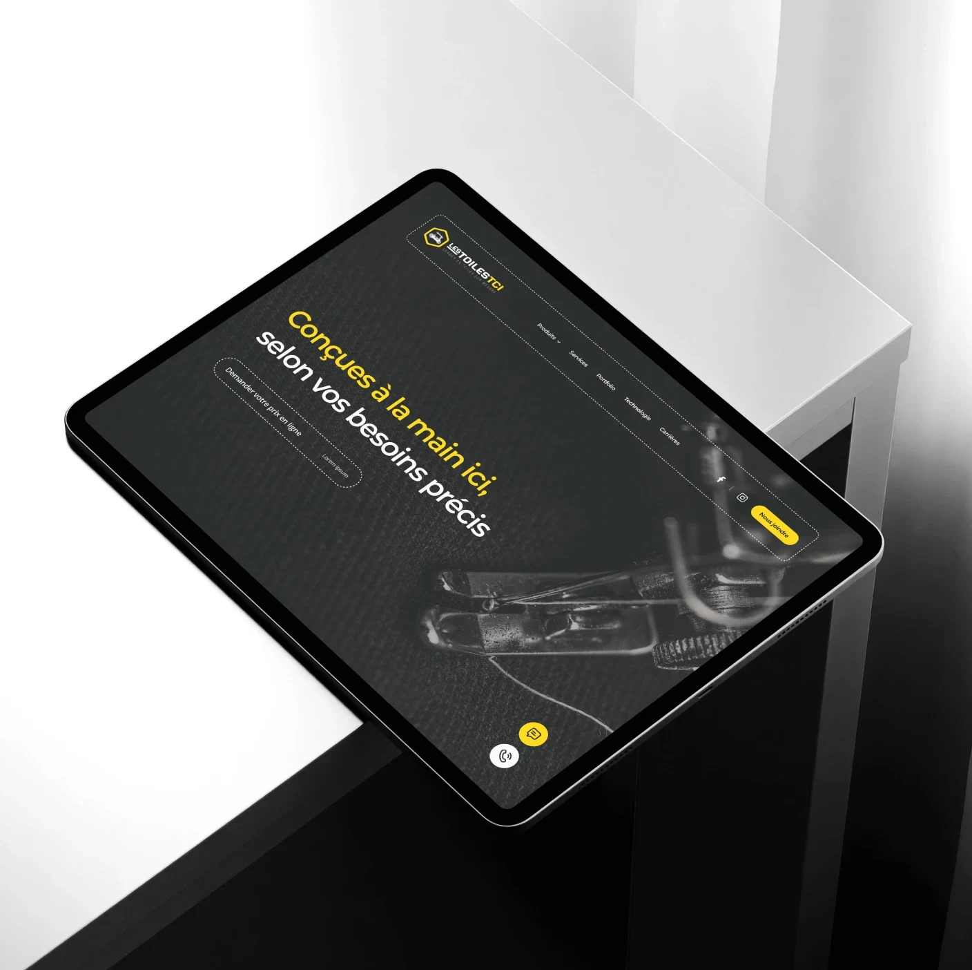 Ordinateur portable affichant le site web de Toiles TCI